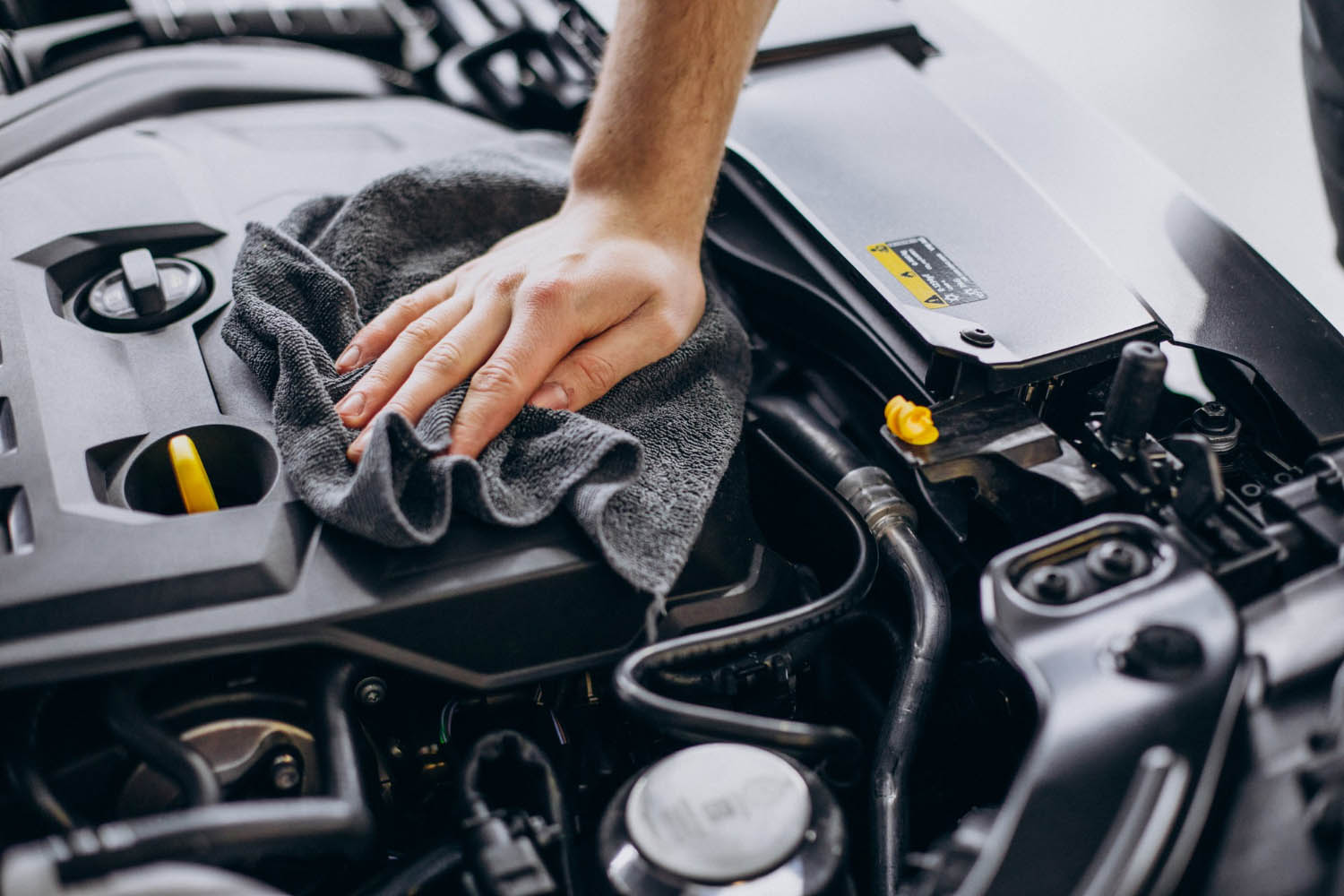 Man cleaning inside car image