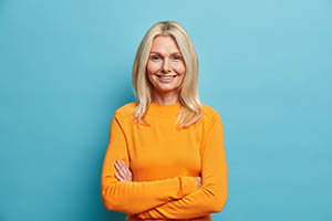 Image of charming middle aged attractive woman with blonde hair