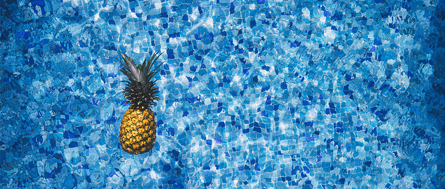 Pineapple on a textured blue background